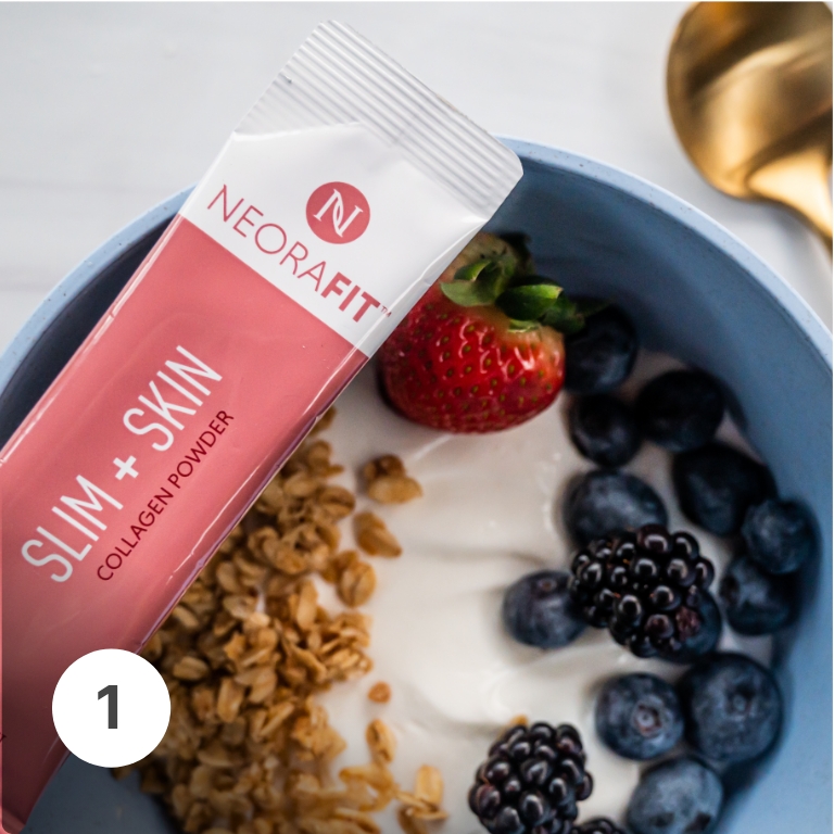 Image of Slim + Skin Collagen Powder sachet on top of a bowl of yogurt with blueberries, strawberries and granola 